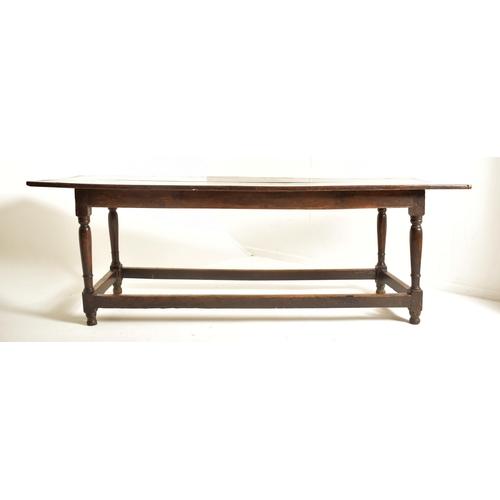 259 - A 17th century oak commonwealth refectory dining table. The table having a rectangular straight top ... 