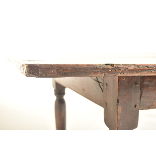 259 - A 17th century oak commonwealth refectory dining table. The table having a rectangular straight top ... 