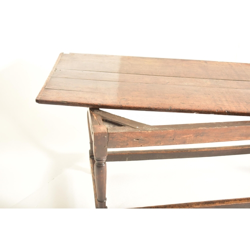 259 - A 17th century oak commonwealth refectory dining table. The table having a rectangular straight top ... 