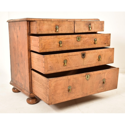 268 - A 17th century Queen Anne walnut chest of drawers. The chest having a crossbanded top with geometric... 