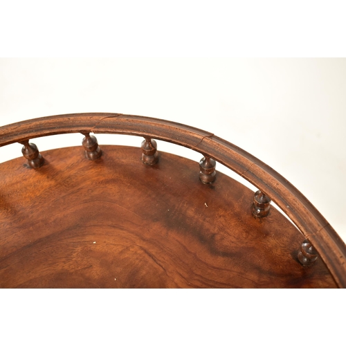 269 - A matched pair of Regency Revival mahogany gallery top tripod wine tables. Each having a turned spin... 