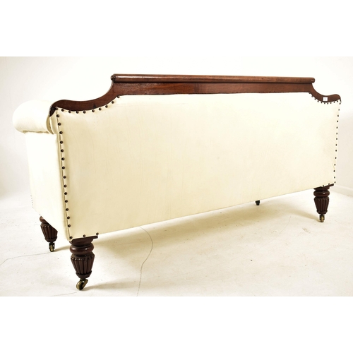 275 - An early Victorian 19th century mahogany framed & white leather three seater sofa. The sofa having a... 