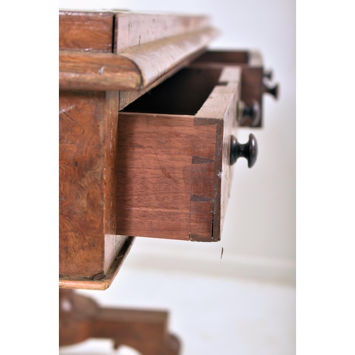 276 - A William IV 19th century pollard oak veneered writing table desk. The table having a central green ... 