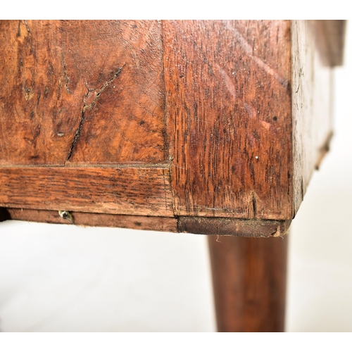 276 - A William IV 19th century pollard oak veneered writing table desk. The table having a central green ... 