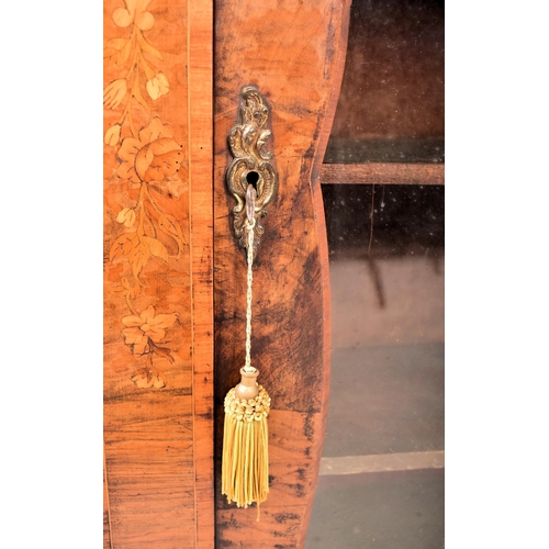 279 - A Victorian 19th century walnut and marquetry inlaid pier cabinet. The cabinet having a straight cha... 