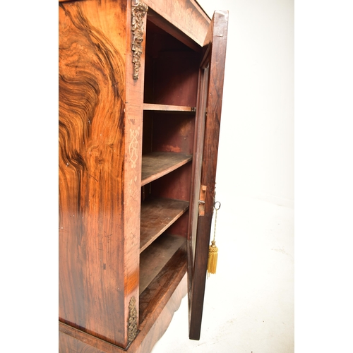 279 - A Victorian 19th century walnut and marquetry inlaid pier cabinet. The cabinet having a straight cha... 