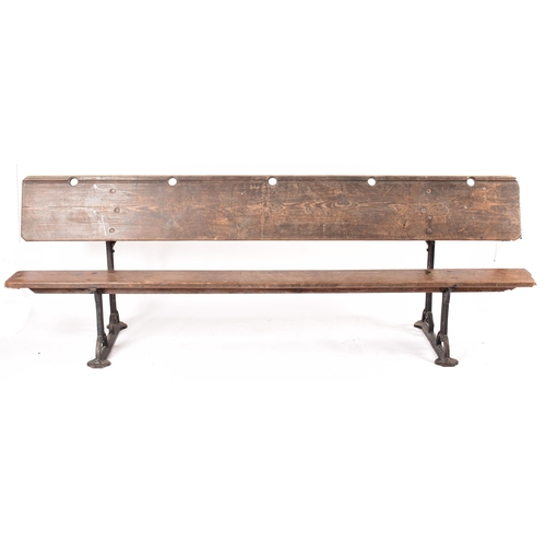 286 - A Victorian 19th century solid pine & cast iron ecclesiastical church bench pew. The bench having a ... 