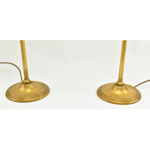 298 - Porta Romana - A pair of toleware style gilded metal palm shaped desk table lamps. Each lamp having ... 