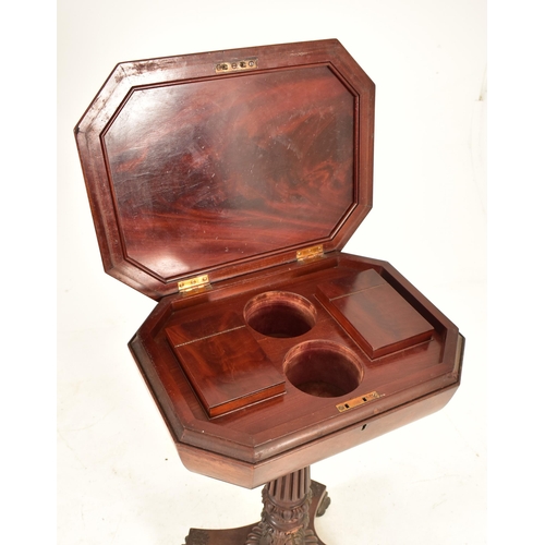 309 - A William IV 19th century flame mahogany octagonal top teapoy tea caddy on stand. The caddy having a... 