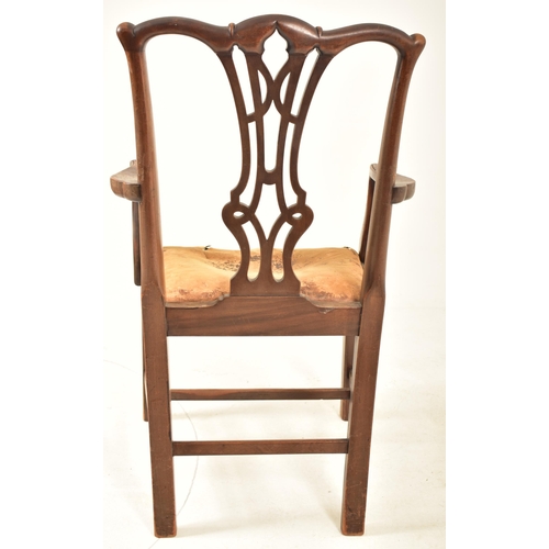 506 - A 19th century George III mahogany extending D-end table with and four chairs. The table having two ... 