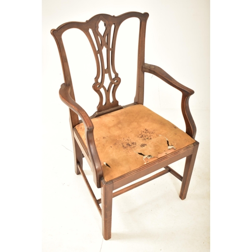 506 - A 19th century George III mahogany extending D-end table with and four chairs. The table having two ... 