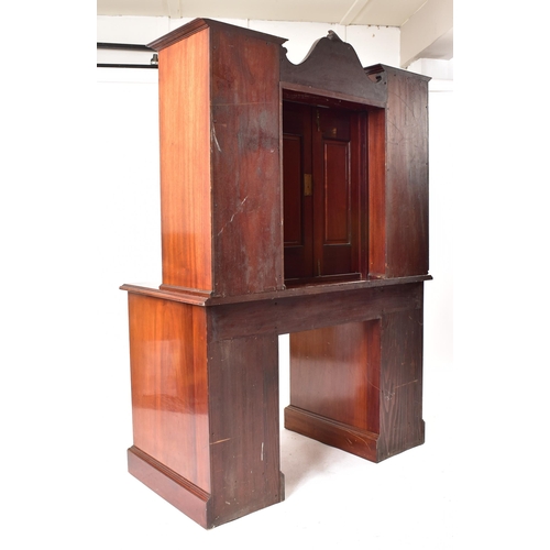 507 - An Arts & Crafts Edwardian mahogany twin pedestal desk cabinet. The cabinet having twin lead coloure... 