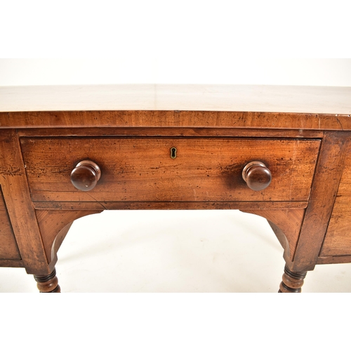 509 - A George III 18th century mahogany dresser credenza. The credenza having a straight top over a centr... 