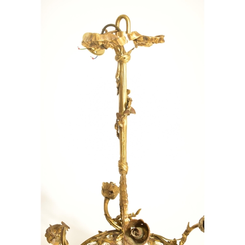 320 - A French early 20th century circa 1920 Louis XV style gilt bronze basket chandelier light. The chand... 