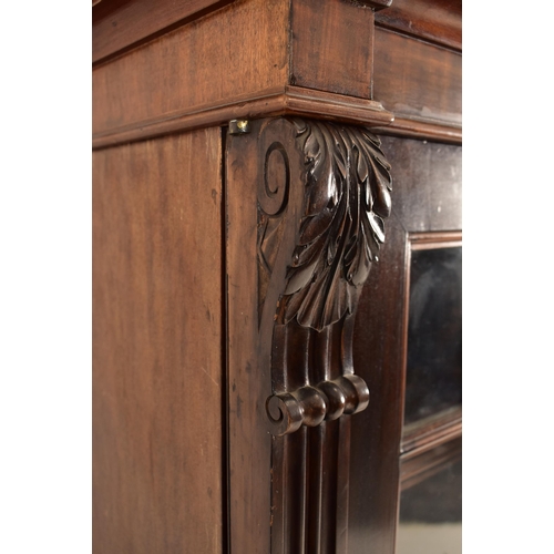 323 - A large George III early 19th century mahogany astragal glazed library bookcase cabinet. The cabinet... 