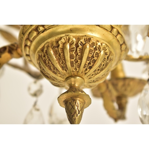 517 - A French early 20th century ormolu & faceted cut glass drops four-arm chandelier electrolier light. ... 