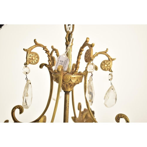 517 - A French early 20th century ormolu & faceted cut glass drops four-arm chandelier electrolier light. ... 