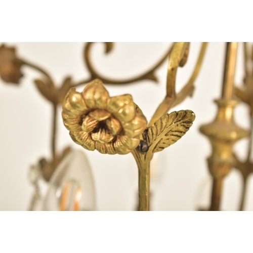 517 - A French early 20th century ormolu & faceted cut glass drops four-arm chandelier electrolier light. ... 