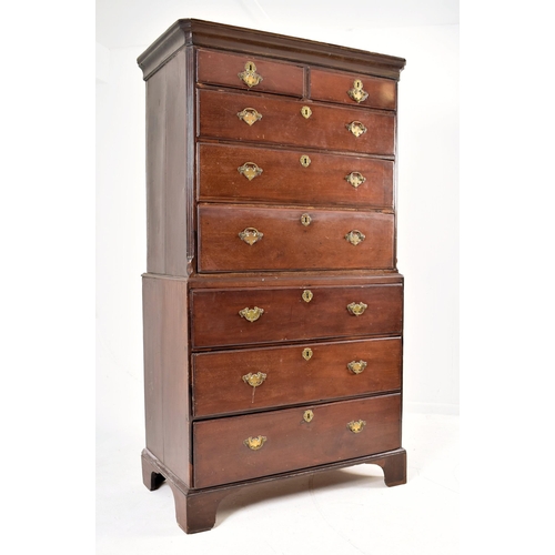 327 - A George III early 19th century mahogany tallboy chest on chest of drawers. The chest having a pedim... 