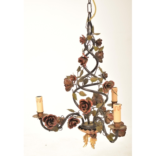 328 - An Italian inspired three arm cage toleware chandelier ceiling light. The light having a twin spiral... 