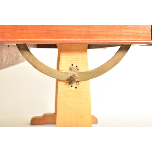 519 - An early 20th century teak wood drop leaf boat / ship table. The table having a rectangular straight... 