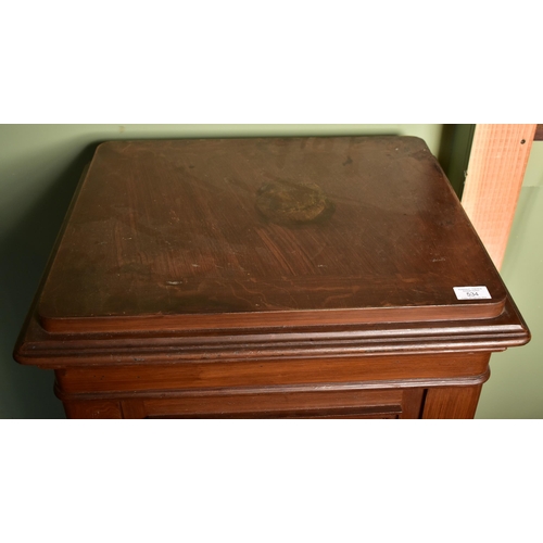 534 - A 20th century solid cast iron bachelor chest of drawers shaped floor safe. The safe in the shape of... 