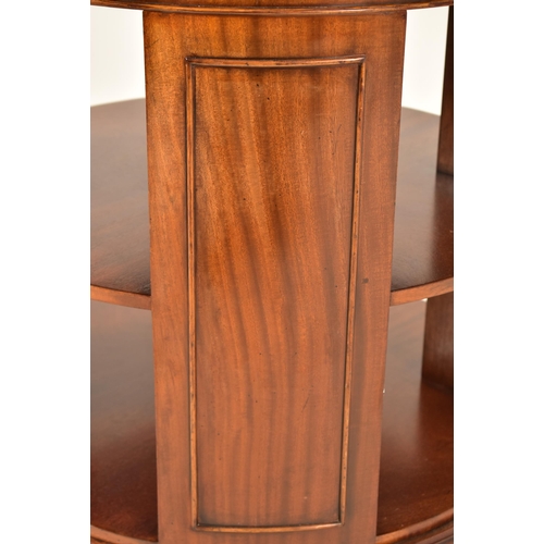 535 - A 20th century Georgian revival mahogany revolving cylinder bookcase. The bookcase of cylindrical fo... 