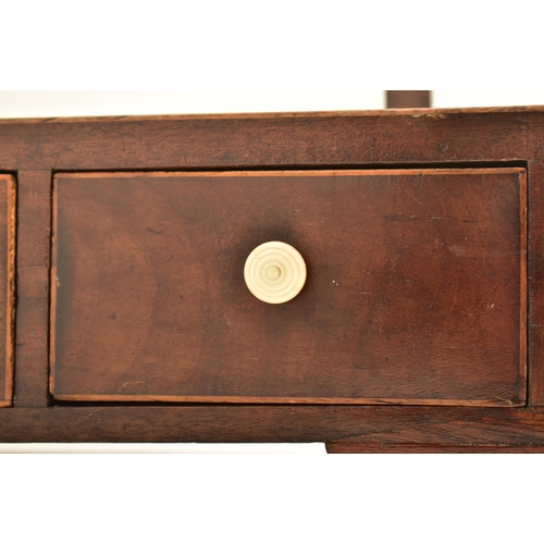 536 - A George III 19th century mahogany and boxwood inlaid toilet dressing table swing mirror. The mirror... 