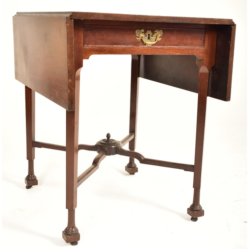 344 - A George III 18th century mahogany drop leaf Pembroke side table. The table having a squared top wit... 