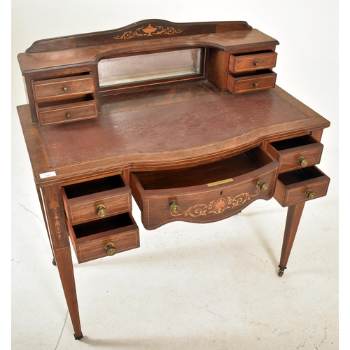 346 - An Edwardian rosewood inlaid Bonheur De Jour ladies writing desk. The desk having a shaped gallery b... 