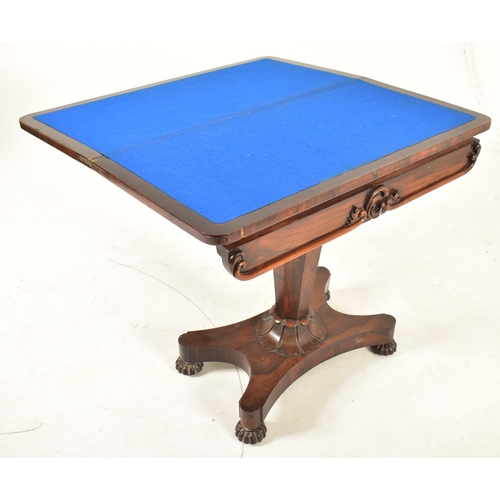 347 - A William IV 19th century rosewood card / games table. Raised on a quatrefoil base with bun feet. Ta... 