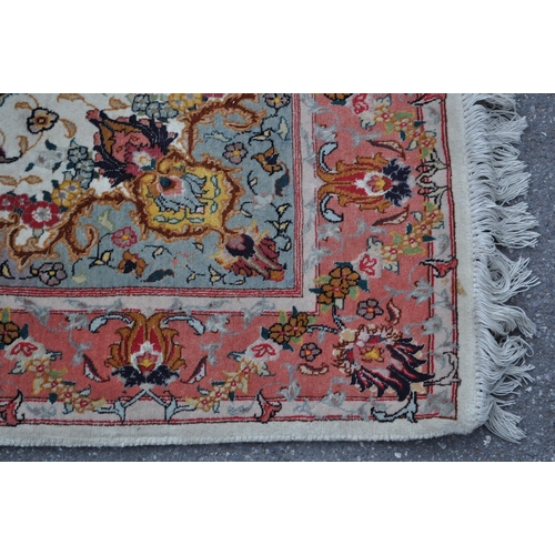 348 - A late 20th century wool with silk Iranian Persian Islamic raj Tabriz carpet floor rug. The rug havi... 