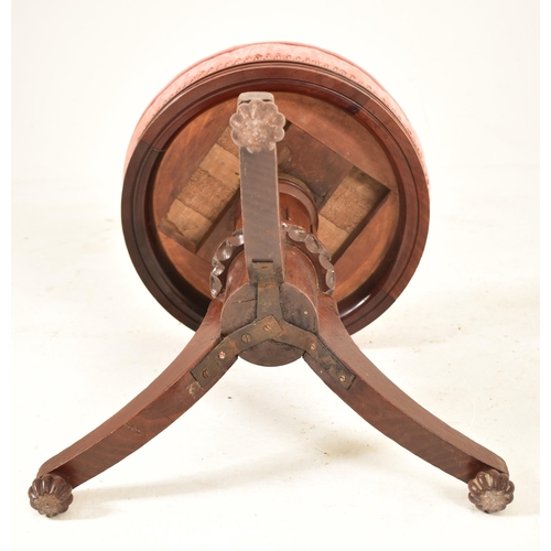 540 - A William IV 19th century carved rosewood piano revolving stool seat. The stool having a circular up... 