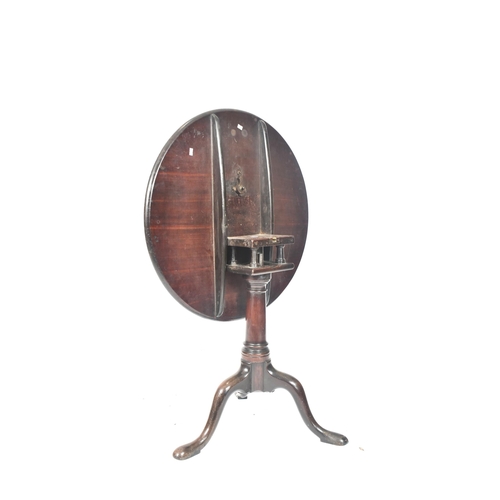 349 - A George III 19th century mahogany tilt top loo table. The table having a pie crust lipped circular ... 