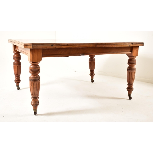 547 - A Victorian 19th century mahogany twin leaf extending dining table together with a set of harlequin ... 