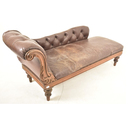 550 - A late Victorian late 19th century brown leather & mahogany framed chaise longue. The chaise having ... 