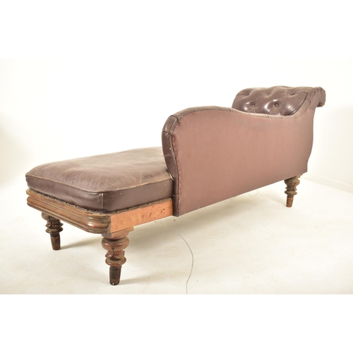 550 - A late Victorian late 19th century brown leather & mahogany framed chaise longue. The chaise having ... 