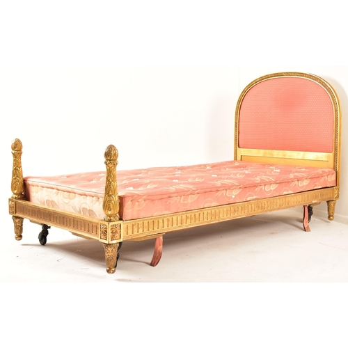 560 - A pair of French second half of 19th century parcel gilt wood & upholstered single beds. Each bed ha... 