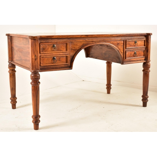 565 - A French inspired walnut writing desk table with chair. The desk having a shaped top with panels det... 