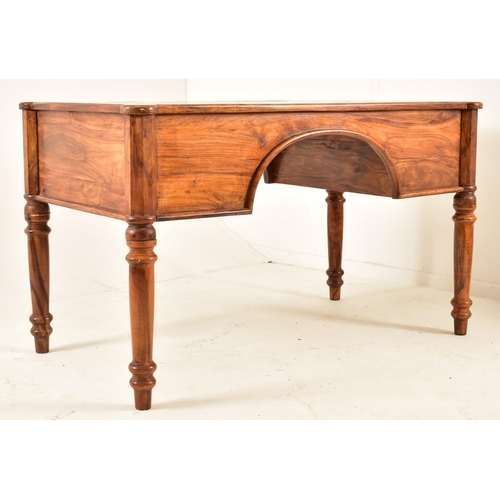 565 - A French inspired walnut writing desk table with chair. The desk having a shaped top with panels det... 