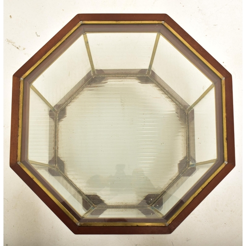 569 - An early 20th century mahogany & glass octagonal display cabinet case / terrarium. The case having a... 