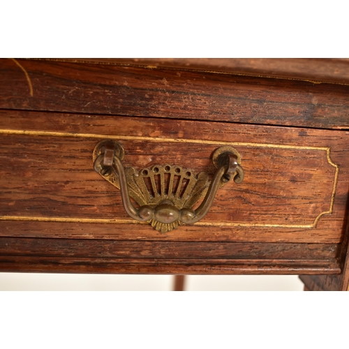 571 - An Edwardian oak & gilt detailed envelope card / game table. The table having a squared folding enve... 