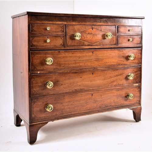 382 - A George III 19th century mahogany chest of drawers. The chest having a chamfered top over a central... 