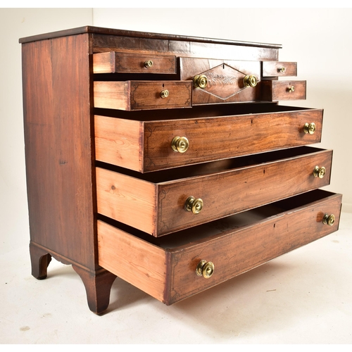 382 - A George III 19th century mahogany chest of drawers. The chest having a chamfered top over a central... 