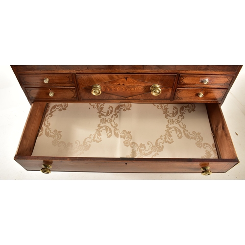 382 - A George III 19th century mahogany chest of drawers. The chest having a chamfered top over a central... 