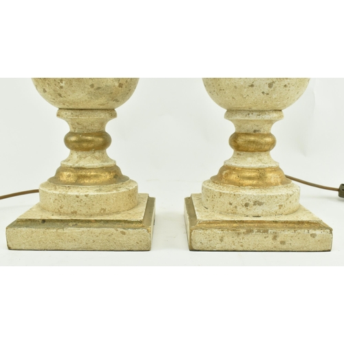 575 - Porta Romana - A pair of gold & cream aged effect wooden desk table lamps in the shape of urns. Each... 