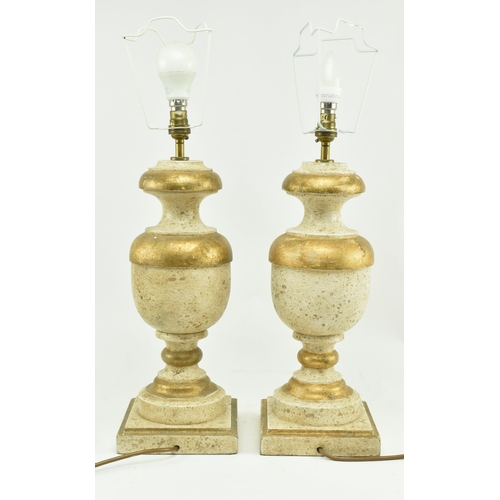 575 - Porta Romana - A pair of gold & cream aged effect wooden desk table lamps in the shape of urns. Each... 