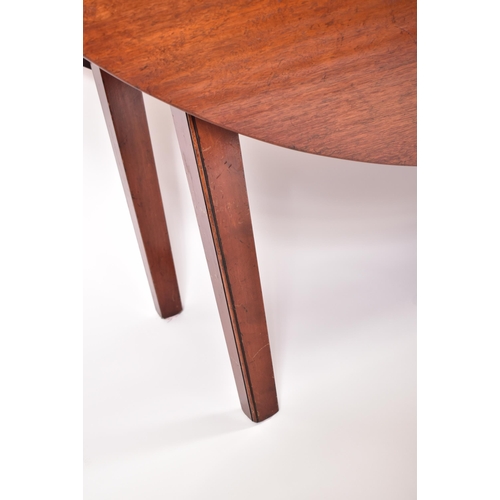 576 - A large 20th century George III influenced mahogany wake / hunt table. The table of elongated form w... 