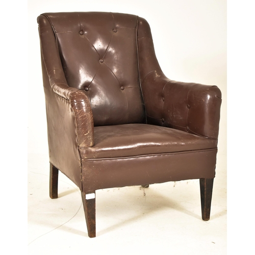 385 - A Victorian style 20th century brown leather button back Chesterfield armchair. The armchair having ... 