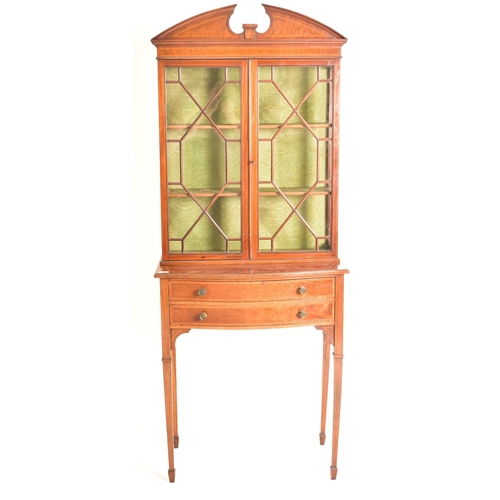 583 - An Edwardian mahogany china display bookcase cabinet vitrine on stand. The cabinet having an astraga... 